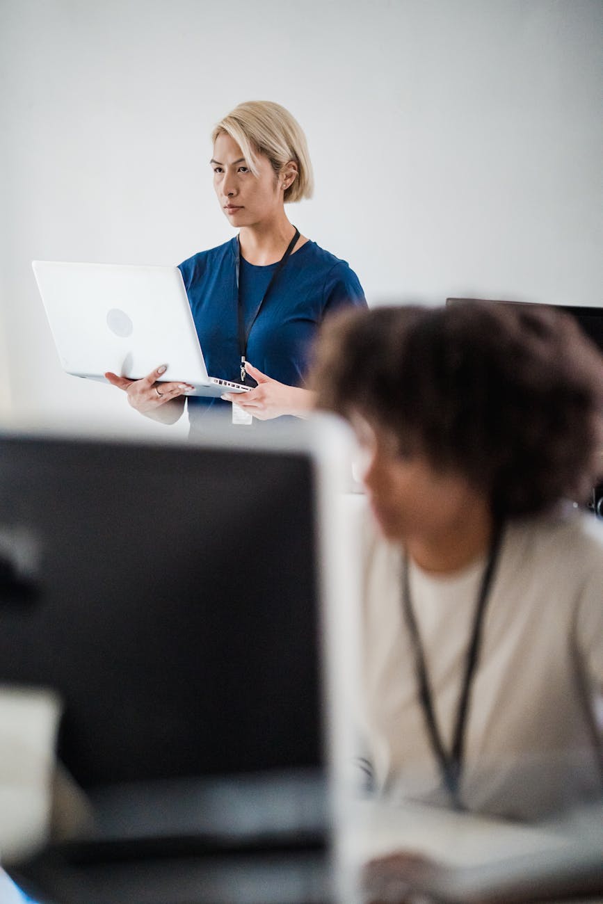 Businesswoman working with a laptop in a modern office environment. Professional setting.